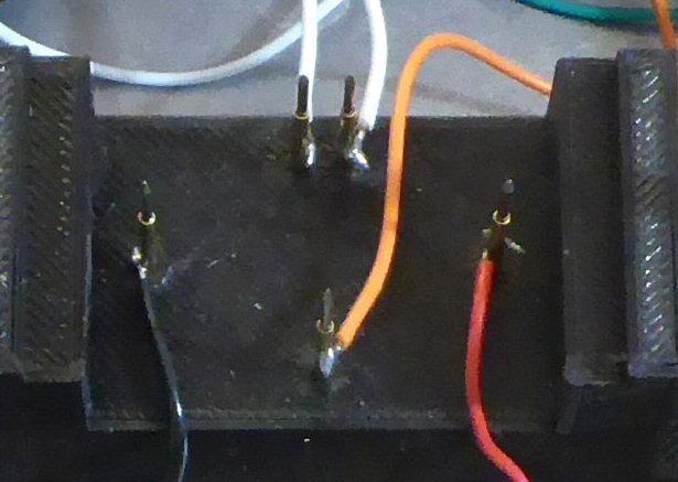 close up of the five spring-loaded clips